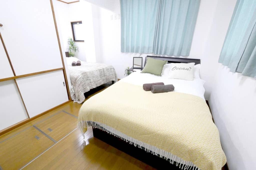 マスク配布ありa5 新宿10分 10人宿泊可能 出張在宅勤務に最適!!宿泊型テレワークスペース!!Wifi完備 回線安定してます!!長期宿泊受付中 Токио Екстериор снимка