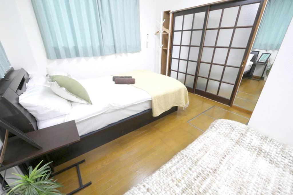 マスク配布ありa5 新宿10分 10人宿泊可能 出張在宅勤務に最適!!宿泊型テレワークスペース!!Wifi完備 回線安定してます!!長期宿泊受付中 Токио Екстериор снимка